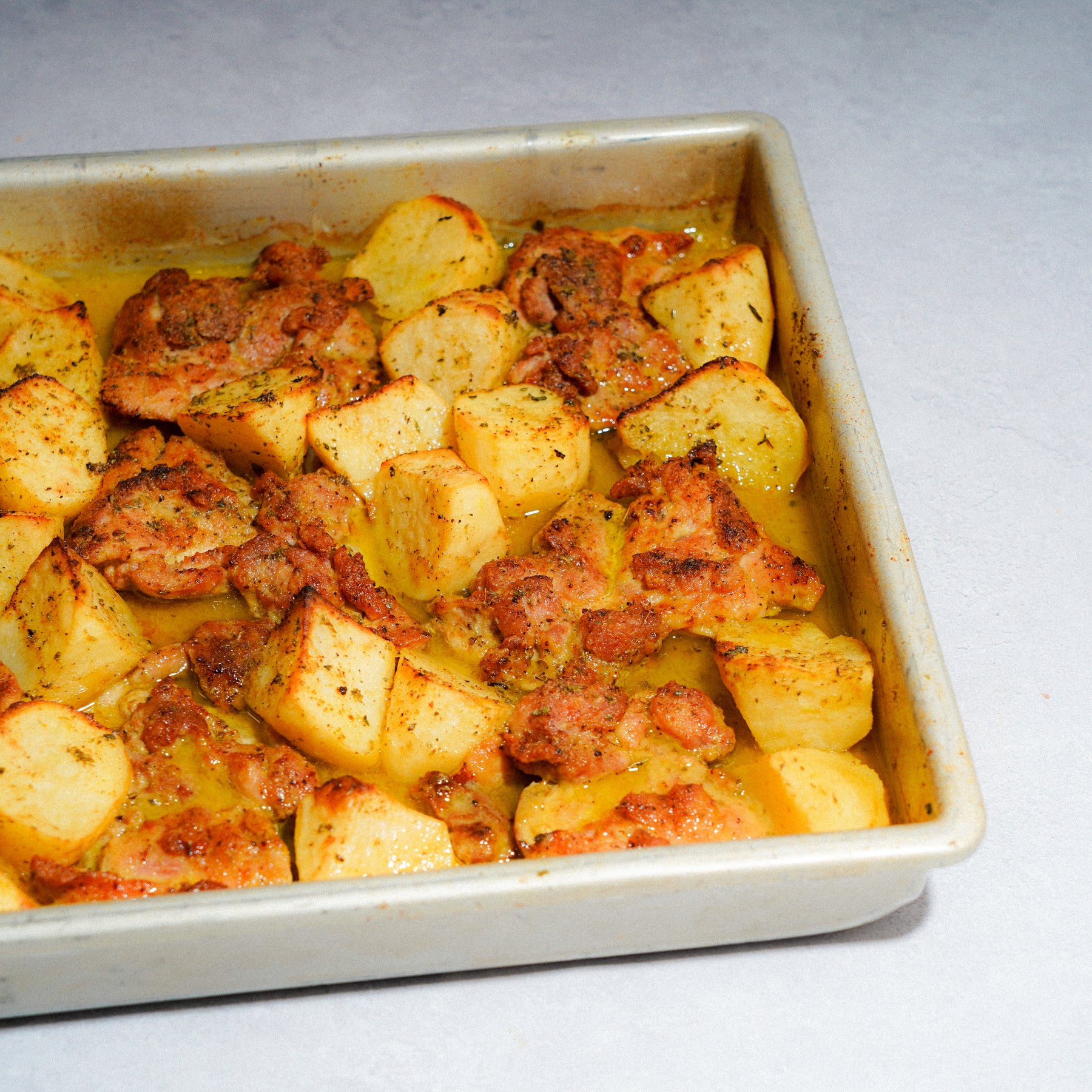 Greek Lemon Chicken Thighs with Roasted Potatoes